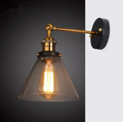 Industrial vintage brass wall sconce with clear glass shade and exposed filament bulb for bedroom decorbites industrial vintage lighting