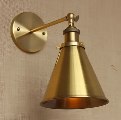 Brass-finished industrial vintage wall sconce with adjustable arm and conical shade for bedroom decorbites lighting