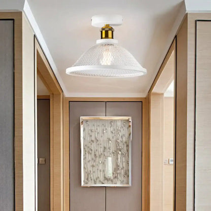 White textured glass pendant ceiling light with brass-finished metal base in decorbites industrial vintage cage style