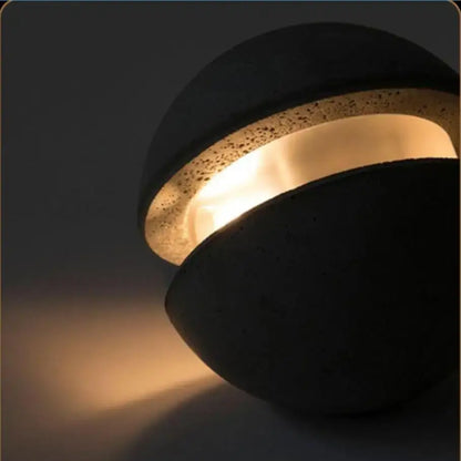 Industrial vintage cement pendant lamp with dark concrete half-sphere and warm glowing inner ring for kitchen dining room decorbites industrial vintage