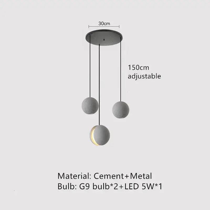 Modern minimalist industrial vintage cement pendant lamp with three matte gray spheres and one illuminated for kitchen decorbites