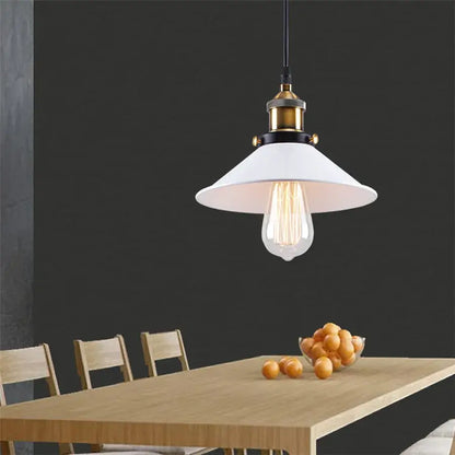White ceramic pendant light with brass accents and exposed filament bulb in decorbites industrial vintage chandelier for dining room