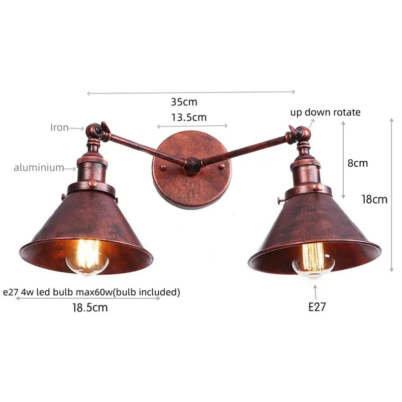 Industrial vintage led brass double arm wall light with copper finish and adjustable arms featuring vintage edison bulbs
