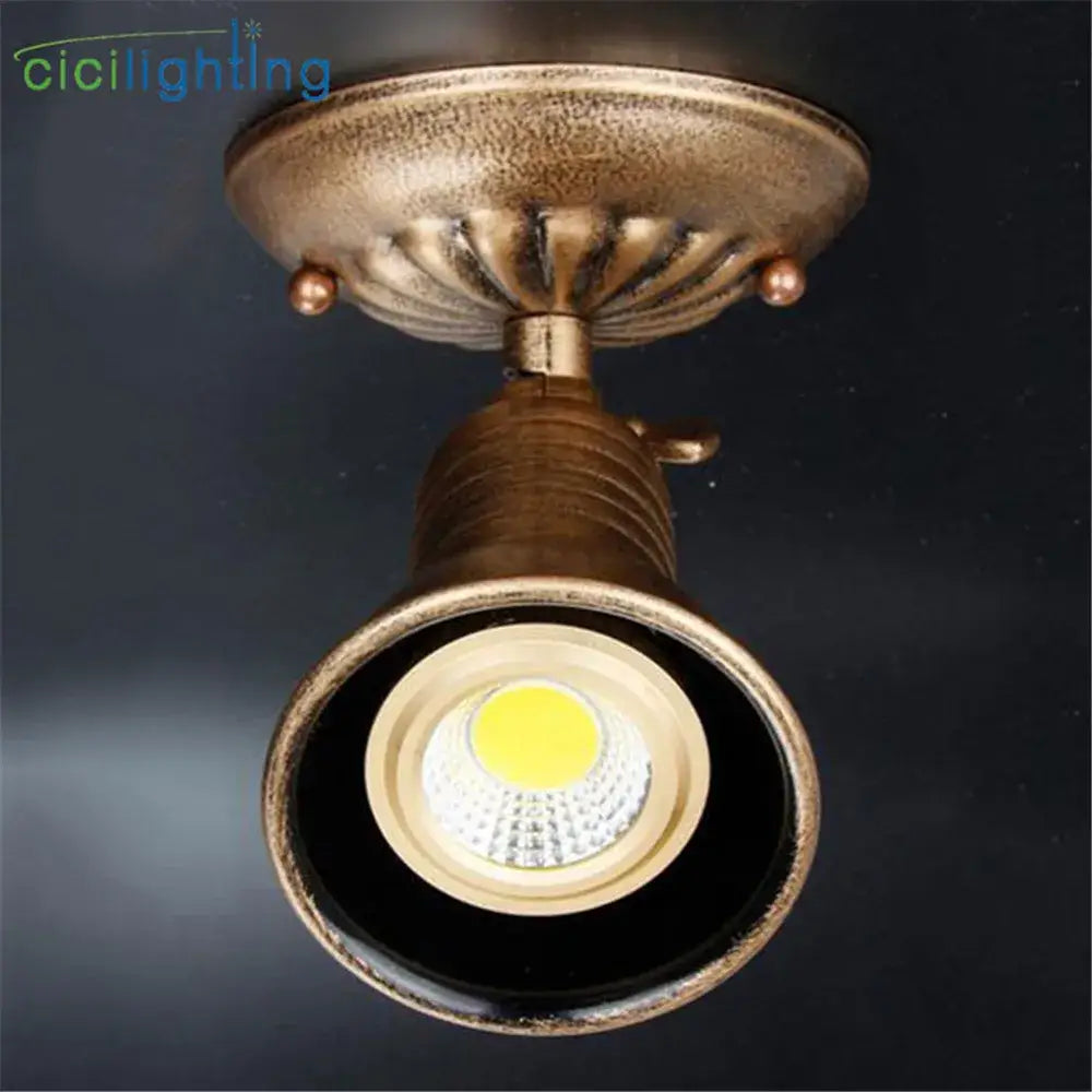 Antique brass industrial vintage led spot ceiling light with textured fluted base and ribbed column for decorbites industrial vintage use