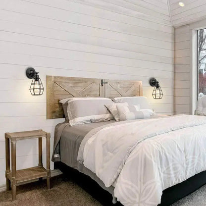 Rustic wooden barn door-style headboard with natural finish and visible wood grain paired with industrial vintage led wall light orange leather bedroom sconce