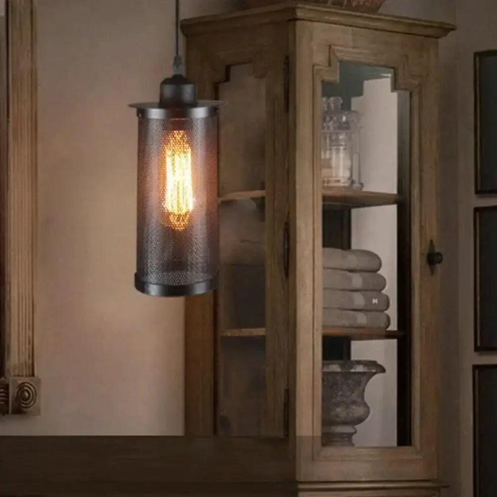 Industrial vintage metal pendant light with black mesh cage and exposed edison bulb for kitchen lighting