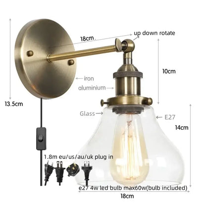 Antique brass-finished wall lamp with clear glass shade and exposed Edison bulb in decorbites industrial vintage silver style