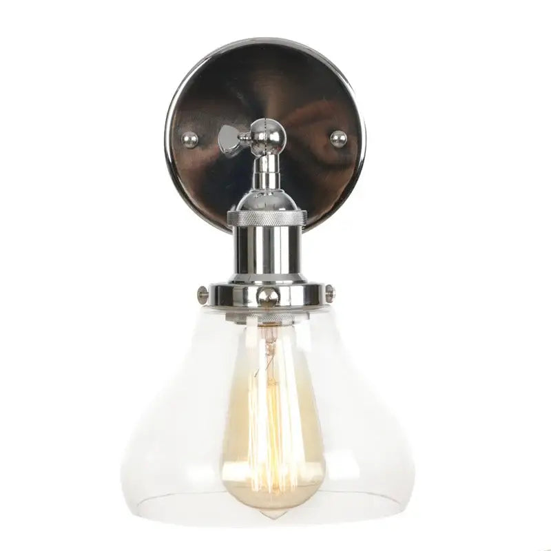 Chrome-finished industrial vintage silver wall lamp with clear glass shade and exposed filament bulb for bedroom decorbites industrial vintage sconce