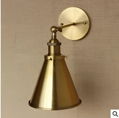 Brass-finished industrial vintage wall lamp with conical shade and adjustable arm for decorbites industrial vintage decor