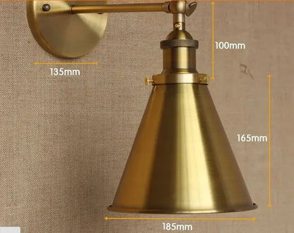 Brass-finished industrial vintage wall lamp with adjustable arm and conical shade ideal for bedroom decorbites industrial vintage style