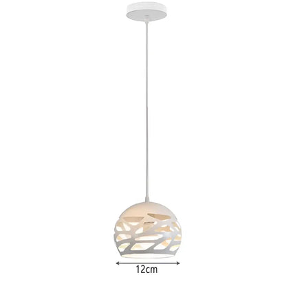 White spherical pendant light with intricate cut-out patterns and frosted glass in decorbites industrial vintage wrought cage design