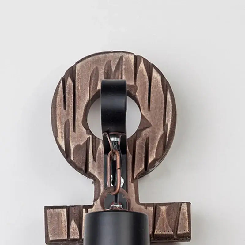 Bronze-colored industrial vintage wood wall lamp with textured wood-grain finish and black metal accents for bedroom decor