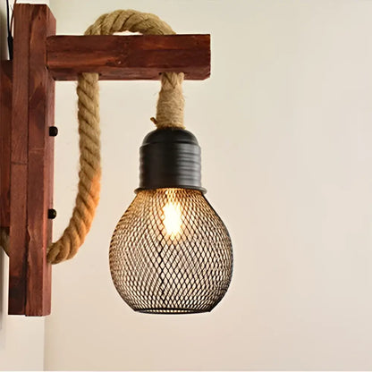 Rustic wooden wall lamp with black mesh bulb and thick beige rope sconce decorbites industrial vintage style