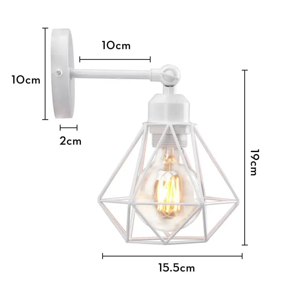 White geometric cage wall sconce with visible filament bulb in brass for bedroom decorbites industrial led wall lighting