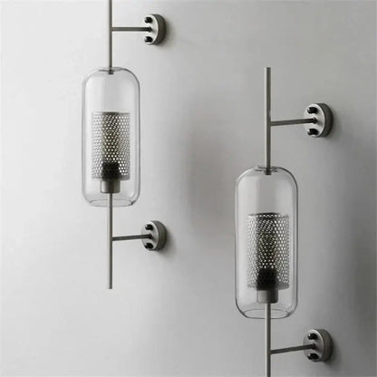 Modern minimalist decorbites industrial wind grid brass wall lamp with clear glass cylinders and perforated metal shades
