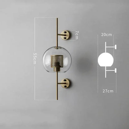 Brass-finished industrial wind grid wall lamp with clear glass globe and perforated metal shade for living room decorbites industrial wind