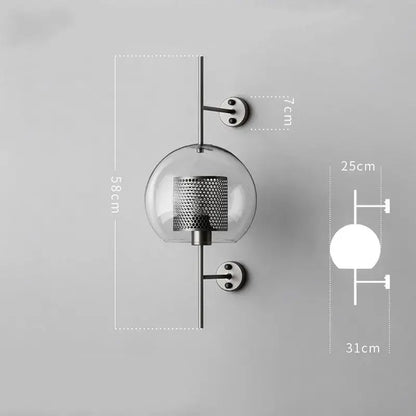 Modern minimalist wall lamp with clear glass globe and black perforated metal cylinder on chrome rods for decorbites industrial wind grid