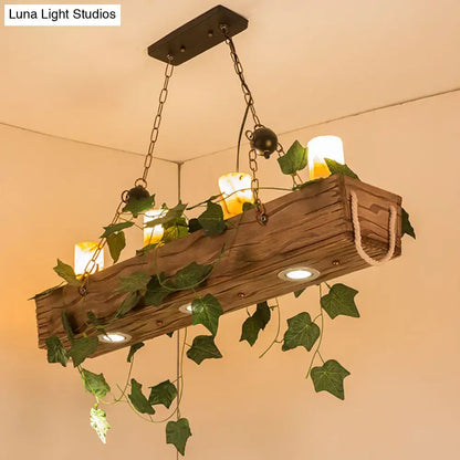 Rustic wooden beam dining room chandelier with integrated e26 e27 candle lights and trailing green ivy vines fixture width