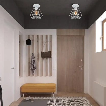 White geometric cage-style ceiling light with exposed filament bulbs decorbites industrial vintage ceiling decor
