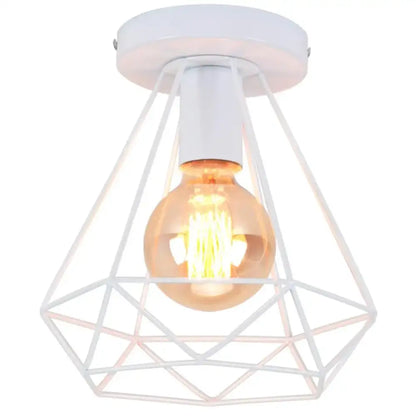 White geometric wire cage ceiling light with warm filament bulb for decorbites industrial vintage ceiling decor