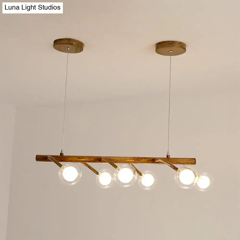Decorbites industrial wooden chandelier with brass arms and modo clear glass shade for dining hall or island lighting