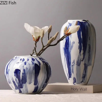 Two ceramic vases with ink style blue and white brushstroke patterns for living room decor featuring ink style flowers