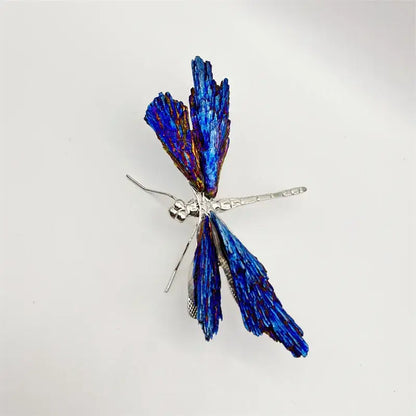 A shimmering blue crystal dragonfly brooch with iridescent wings and silver-toned body decorative figurines decorbites crystal dragonfly