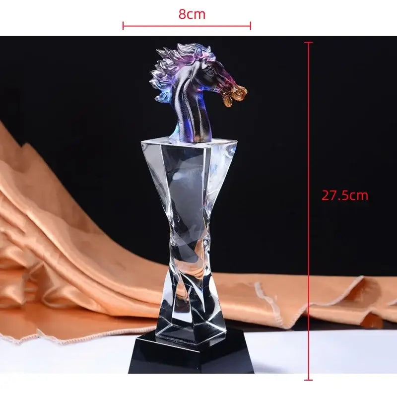 A translucent iridescent decorbites crystal horse trophy with a faceted crystal base for living room decor