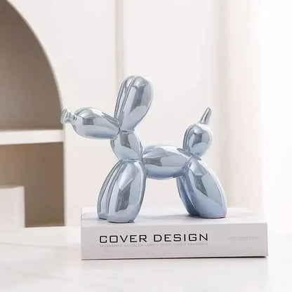 Shiny silver balloon dog ceramic sculpture with smooth reflective surface and sleek design for living room decor