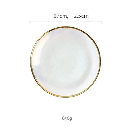 A white ceramic salad bowl with gold rim and iridescent glaze measuring 27cm for dining tableware