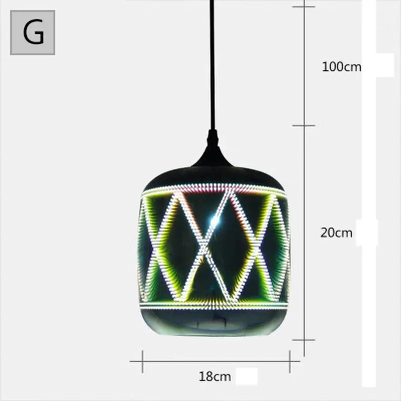 A sleek black glass pendant light with a cylindrical shade and illuminated green and white geometric led pattern
