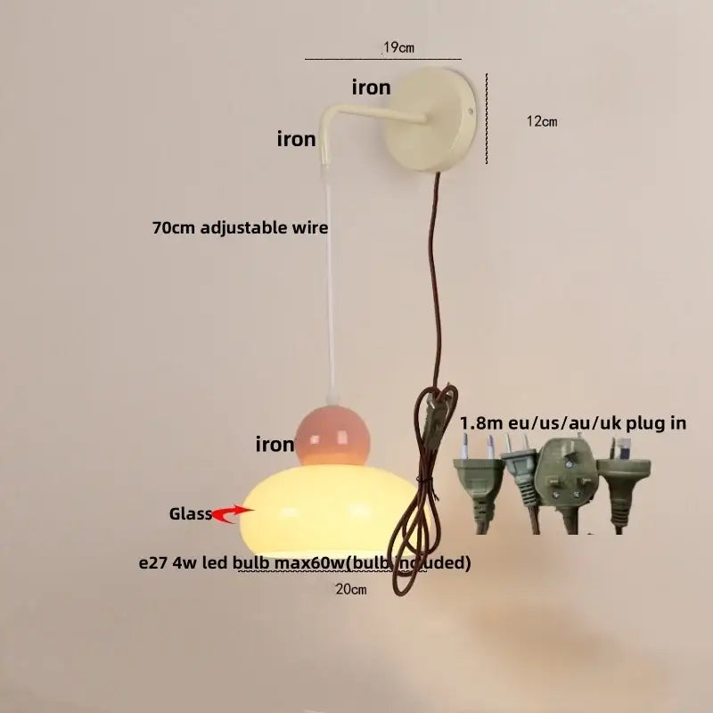 Cream-colored wall light with iron nordic led mounting bracket and glass globe shade for bedroom decorbites iron nordic