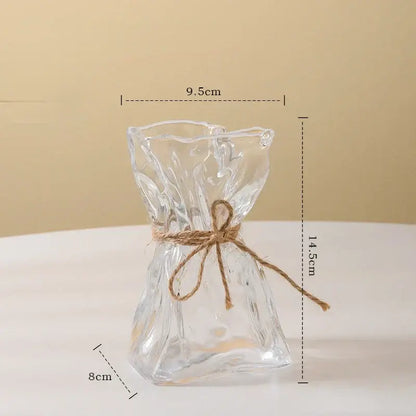 Irregular folded clear glass vase with crinkled design and rustic brown twine bow for living room decorbites clear glass decor