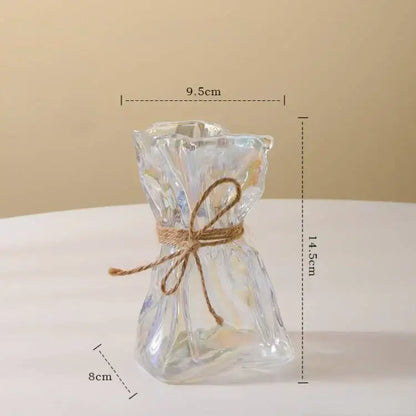 Irregular folded clear glass vase with faceted design and rustic twine bow for living room decorbites clear glass decor