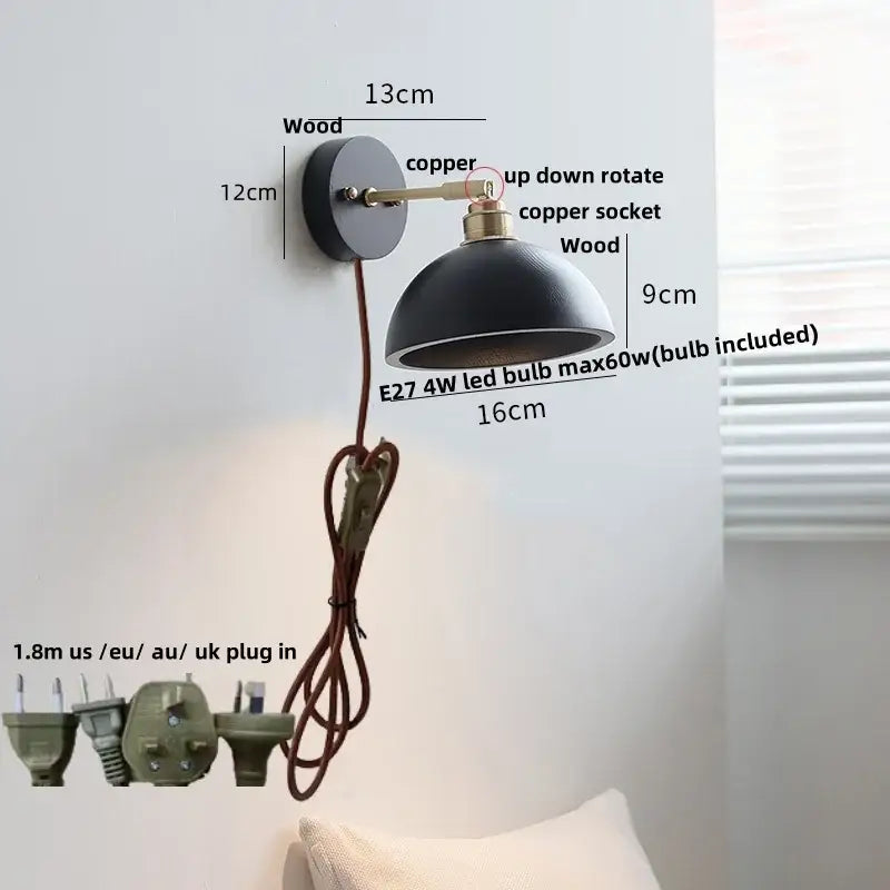 Japanese black wood wall light featuring a black dome wall lamp with wooden base and copper accents by decorbites