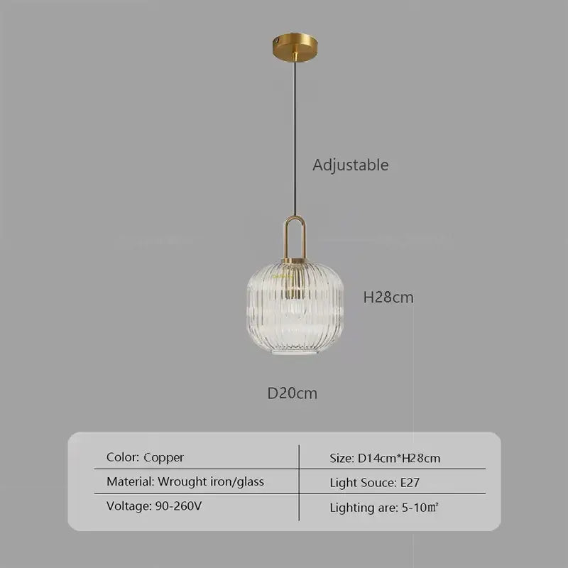 Copper-finished pendant light with ribbed glass globe and wrought iron details helps create a stylish kitchen ambiance