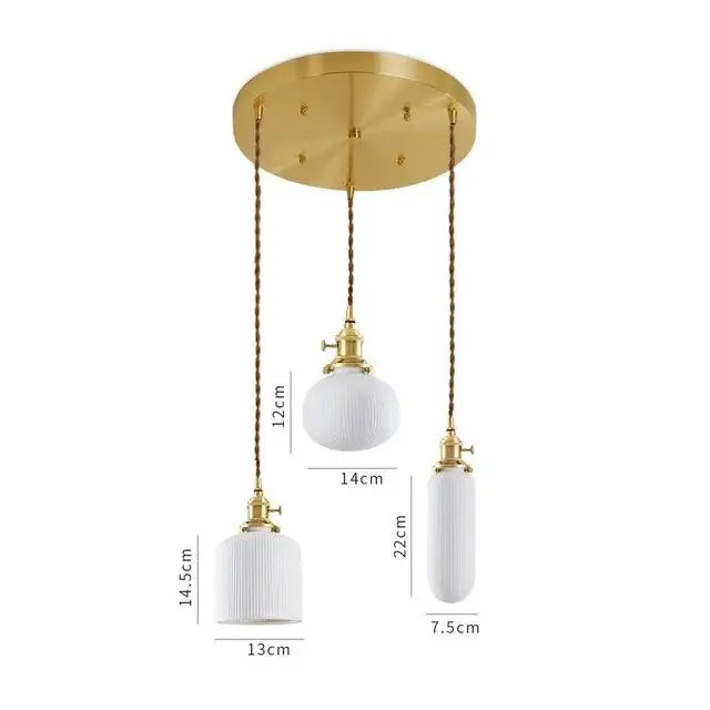 Gold-toned ceiling fixture with three white ribbed glass decorbites ceramic led pendant lights suspended by twisted cords