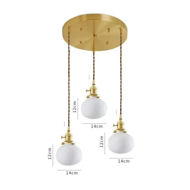 Gold-toned ceramic led pendant light with three white ribbed glass globes suspended by twisted brown cords for dining room decorbites ceramic led