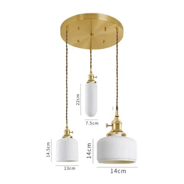 Set of three elegant white ribbed ceramic led pendant lights with gold fixtures and braided cords for dining rooms