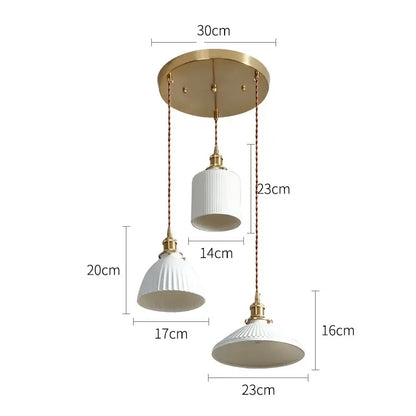 Japanese cream ribbed ceramic led pendant light set with brass accents and braided cords for dining room decorbites ceramic led