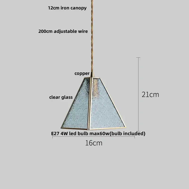 A modern japanese geometric glass led pendant lamp with clear textured glass and copper frame for dining room lighting