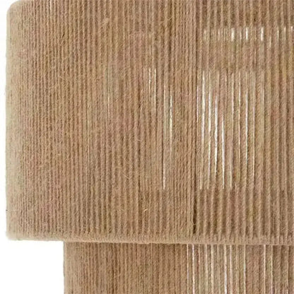 A roll of natural brown jute twine used as natural materials for japanese golden two tiered woven pendant light light source