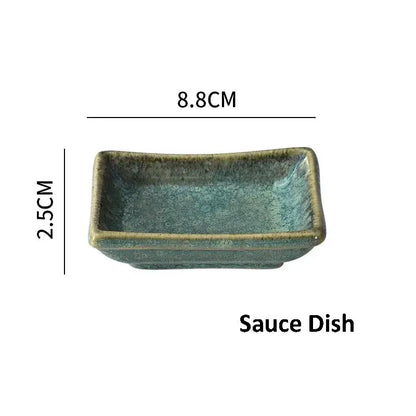 A rectangular ceramic sauce dish with textured teal glaze and earth toned rim from decorbites ceramic dinnerware set