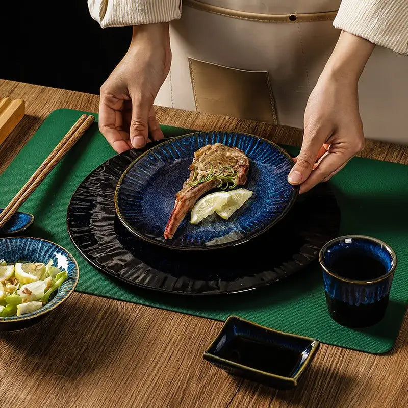 Deep blue textured ceramic dinner plate with raised rim from decorbites ceramic dinnerware set for dining use