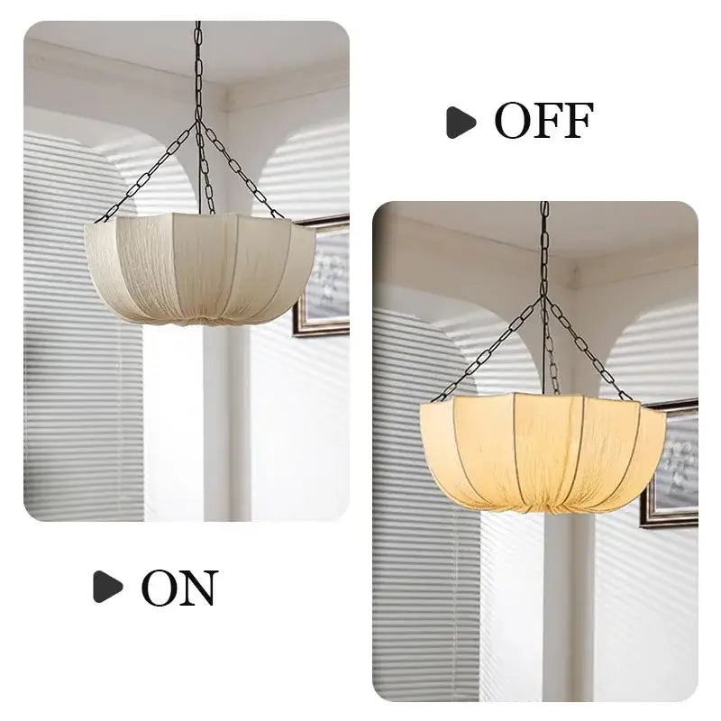 Beige pleated fabric pendant light with black metal chain suspension as a refined choice cord pendant for hospitality settings