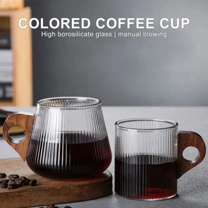 Clear ribbed glass coffee mugs with wooden handles in two sizes ideal for glass coffee or tea use in the kitchen
