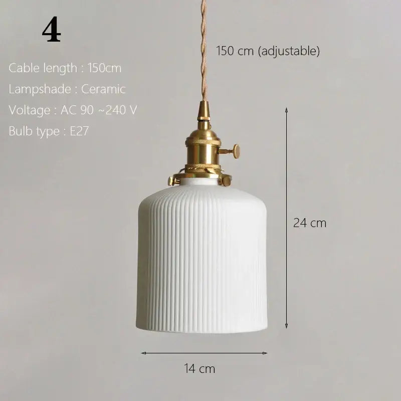 White ceramic pendant light with vertical ridges and brass fixture ideal for kitchen and dining room lighting