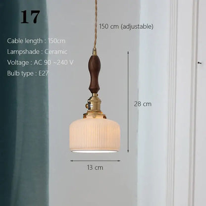 Vintage-style ceramic pendant light with ribbed off-white glass shade and brass hardware for kitchen dining room