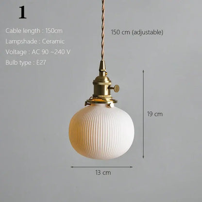 Vintage-style ceramic pendant light with ribbed off-white shade and brass hardware for kitchen and dining room use