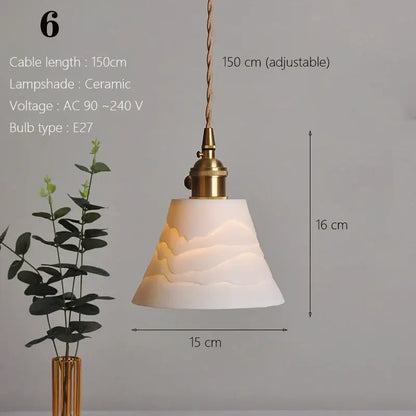 Japanese ribbed white ceramic pendant light with textured mountain design and brass hardware for kitchen dining room